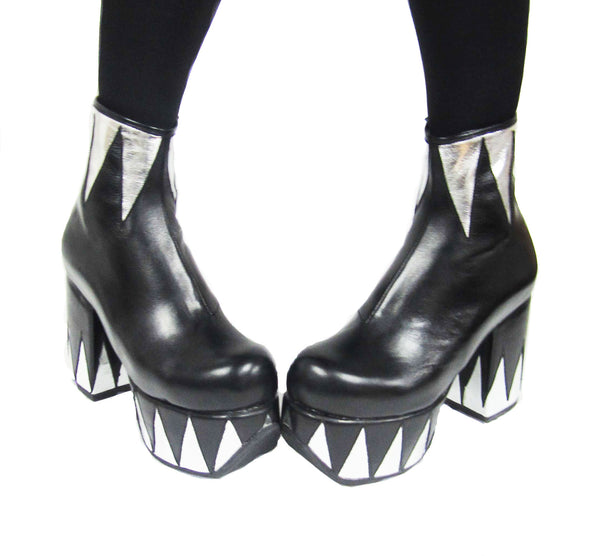 Model Wearing Ringmaster Platform Ankle Boots in Black with Silver Circus Triangle Details in Vegan or Genuine Leather Front View