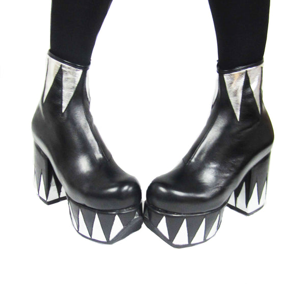 Model Wearing Ringmaster Platform Ankle Boots in Black with Silver Circus Triangle Details in Vegan or Genuine Leather Front View
